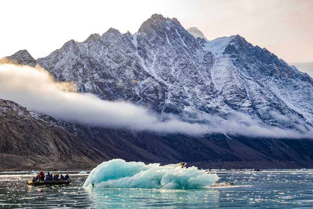 Guest on Zodiac in Alpejord Fjord, Greenland